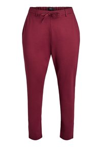 Pantalons de jogging bordeaux en tissu doux, avec une taille élastique à cordon de serrage, des poches latérales et des jambes fuselées.