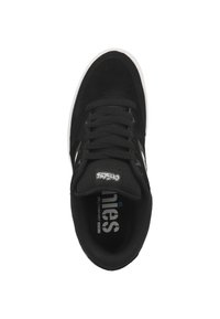 Black suede sneaker with a padded collar, white rubber outsole, and black laces. Features logo on the tongue and side accents.