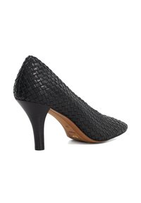 Black woven leather high heel shoe with a pointed toe and a slender heel. Textured surface with a smooth insole and a light brown sole.