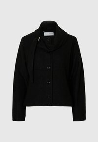 Must be pressed on the collar for a polished look. Black women’s button-up jacket with long sleeves and a draped collar that includes an attached scarf, set against a simple background.