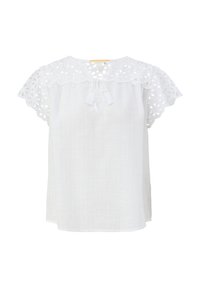 Blusa bianca con tessuto texturizzato, dettagli in pizzo lavorato all'uncinetto sul collo e sulle maniche, e chiusura a lacci sul davanti.