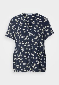 Blouse bleu marine à manches courtes avec motif floral de marguerites blanches et jaunes et col en V.