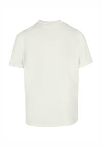 Kortærmet t-shirt i off-white bomuld, med en standard rund hals og en afslappet pasform. Glat tekstur uden synlige mønstre eller detaljer.