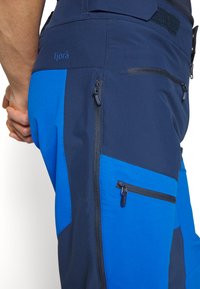 Norrøna FJØRÅ PANTS - Calças de ciclismo - indigo night/olympian blue