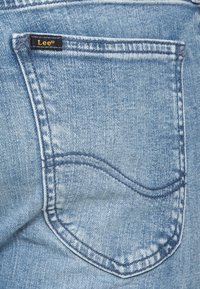 Lee MALONE - Calças de ganga de corte skinny - dust worn