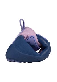 Flexible dark blue and lavender sneaker folded to show its soft, textured sole and fabric upper with pull-tab loop.