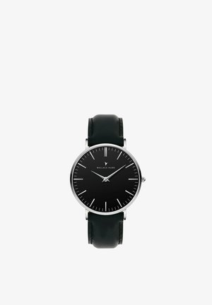 Montre analogique avec bracelet en cuir noir, cadran noir, index argentés et aiguilles argentées indiquant l'heure 10:08.