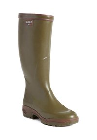 Green rubber knee-high boot with brown accents, textured finish, and a chunky sole. Features a logo badge near the top. Round toe design.
