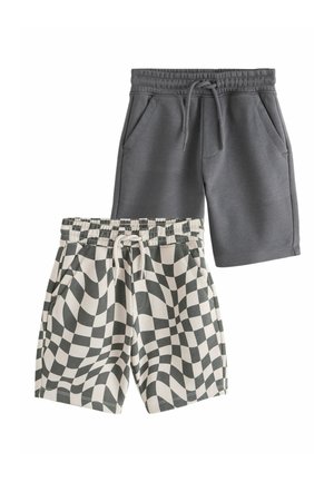 Dva páry krátkych nohavíc s elastickým pásom, jeden v jednofarebnej tmavo sivej farbe a druhý s čiernobielym vlnitým kockovaným vzorom, oba s prednými vreckami a šnúrkami na stiahnutie.