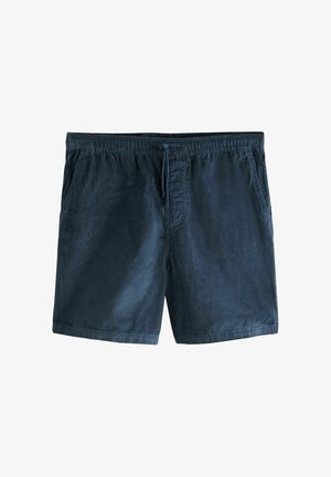 Tumedat sinelad puuvillased lühikesed püksid elastse vöökoha, paelaga kinnituse ja kahe küljetaskuga. Omavad vertikaalset soonikutekstiili.