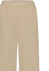 Beige wijde broek met een elastische tailleband, gekenmerkt door een zachte textuur en een eenvoudig, onversierd ontwerp.