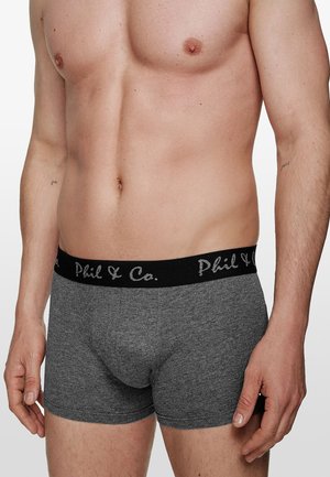 Boxers grijs en doux en coton, avec une ceinture noire arborant le logo argenté "Phil & Co.". Design ajusté, longueur mi-cuisse.