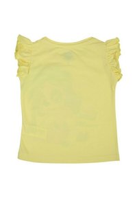 T-shirt jaune à manches courtes avec des manches volantes. En coton doux. Présente un design de personnage décoloré au dos. Texture lisse.