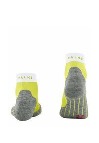 Calcetines hasta el tobillo con un esquema de color gris y amarillo neón. Acentos amarillos y la marca "FALKE" en el puño blanco. Suela texturizada gris.