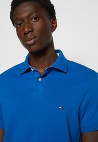 Tommy Hilfiger REGULAR - Polo - greek isle blue