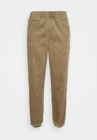 Corduroy broek in een gedempt bruine kleur, met een zachte textuur, elastische tailleband en verticale ribbelpatroon. Tapered leg ontwerp.