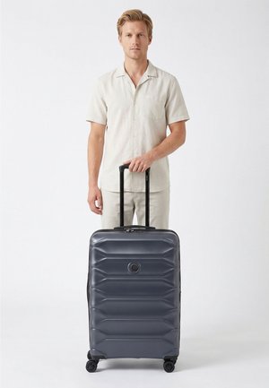 Delsey Paris, METEOR 4 ROLLEN TROLLEY 68 CM MIT DEHNFALTE UNISEX - Maleta de cabina - ocean blue
