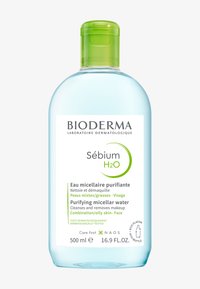 Bioderma Sébium H2O, 500 ml. Bouteille en plastique transparent avec un bouchon vert. Étiquette blanche et verte détaillant le type de produit et son utilisation pour les peaux grasses.