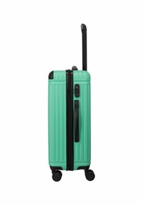 Hartschalenkoffer in Türkis mit vertikalen Rillen, schwarzem Reißverschluss und Griff. Verfügt über einen ausziehbaren Griff und vier Räder für Mobilität.