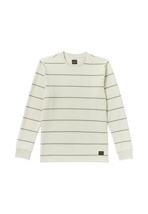 Haut à manches longues crème avec de fines rayures horizontales vert olive, texture côtelée et col ras de cou. Petit logo de la marque en bas.