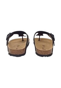Sandali neri open-back con suole in sughero. Cinghia regolabile e soletta testurizzata. Presentano un design minimalista senza modelli o accenti aggiuntivi.