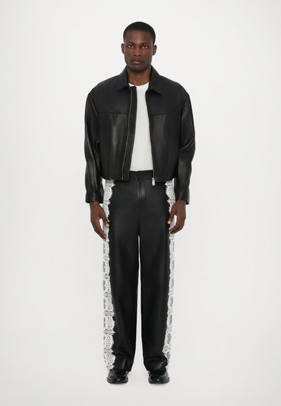 Les Benjamins Pantalon en cuir - black