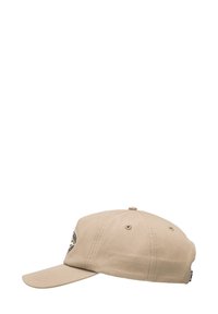 Khaki cotton baseball cap with a curved brim, embroidered logo detail on the front, and ventilating eyelets on the crown.