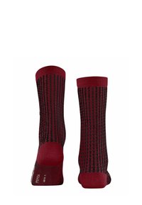 Rote und schwarze Socken mit einem gemusterten Design und Rippstruktur. Das Material wirkt weich und verfügt über verstärkte Fersen und Zehen für hohe Haltbarkeit.