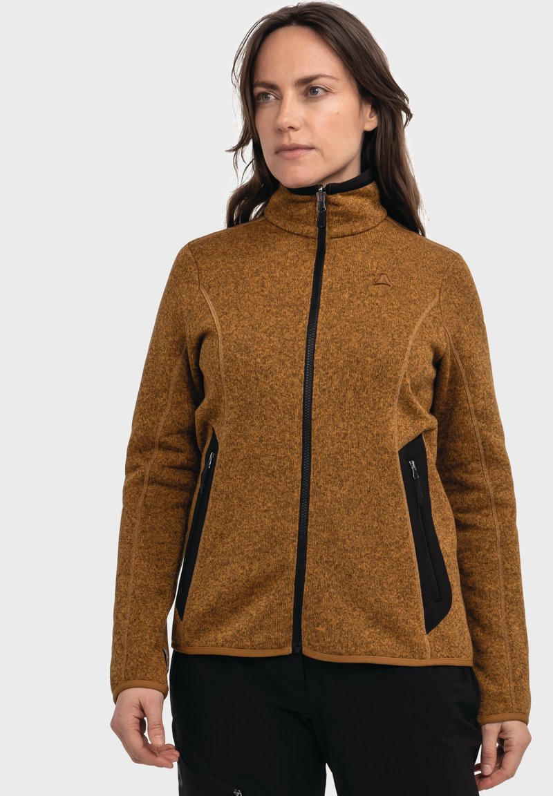 Fleecejacke in strukturiertem Braun mit hohem Kragen, schwarzen Reißverschlusstaschen und kontrastierenden Akzenten entlang des Saums und der Bündchen.