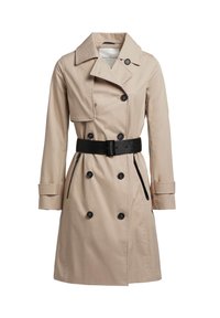 Beige trenchcoat med dubbelknäppt design, svarta knappar, ett åtdraget svart bälte och krage. Har sidofickor och detaljer vid ärmsluten.