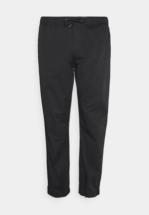 Black lightweight pants with an elastic waistband and drawstring. Cuffed hems and a smooth texture. Simple, clean design without patterns.