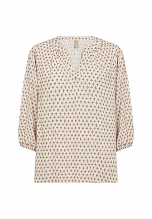 Lightweight, cream blouse with a V-neck, three-quarter puff sleeves, and a repeating diamond pattern in rust. Soft fabric texture.