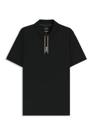 Black polo shirt made of soft fabric, featuring a collar, short sleeves, and a zippered placket with a gold accent and logo detail.