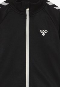 Hummel HMLKICK - Träningsjacka - black