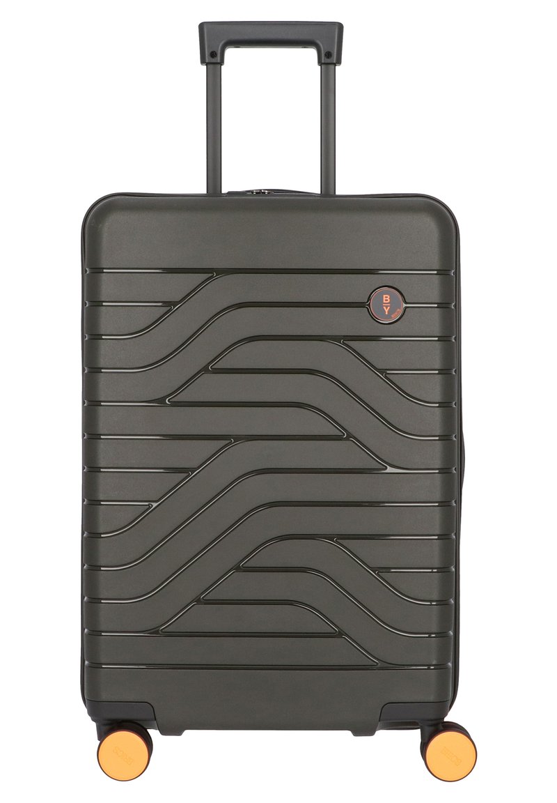 Valigia rigida di colore verde scuro con design testurizzato ondulato, manico retrattile, quattro ruote con accenti arancioni e logo del marchio.