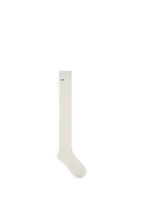 Chaussettes montantes off-white, en tissu texturé. Présentent un design sobre avec un petit logo bleu près du bord.