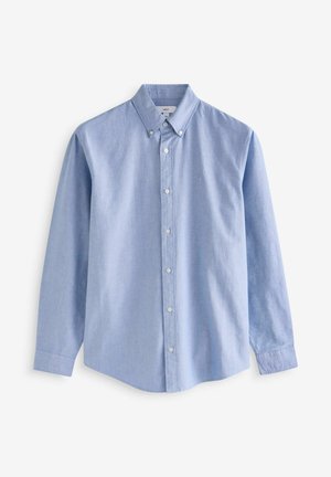 Hele sinine nööbitav särk klassikalise krae, pikkade varrukate ja sirge äärega. Valmistatud siidisest materjalist, pehme tekstuuriga.