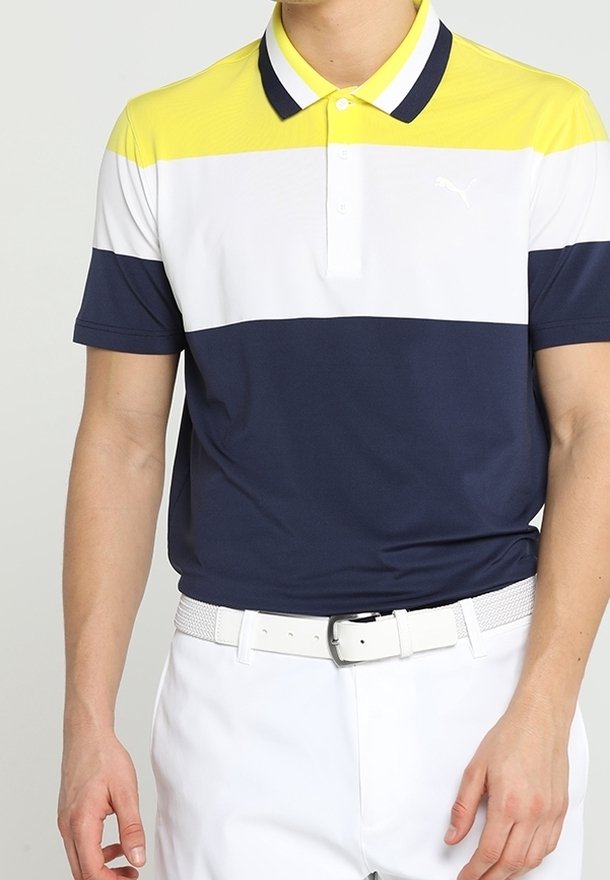Poloshirt met horizontale strepen in geel, wit en marineblauw. Gemaakt van een gladde stof met een klassieke kraag en knopenlijst.