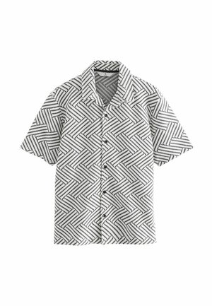 Kortärmad skjorta med ett svartvitt geometriskt mönster och zigzag-linjer. Tillverkad av lättviktig tyg med krage och knappar.