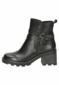 Botines negros de cuero texturizado, con un tacón grueso y dos correas con hebillas. Cuenta con una punta redondeada y una suela robusta para mayor tracción.