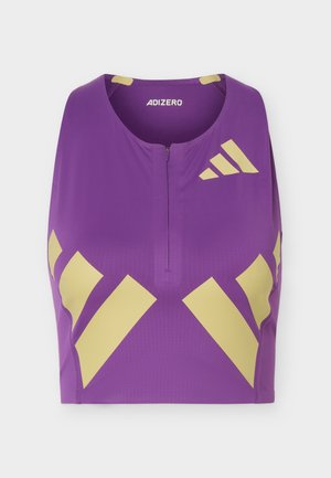 Μωβ αθλητικό τοπ χωρίς μανίκια με χρυσά γεωμετρικά σχέδια και κοντό φερμουάρ μπροστά, με την ένδειξη "ADIZERO" στον λαιμό.