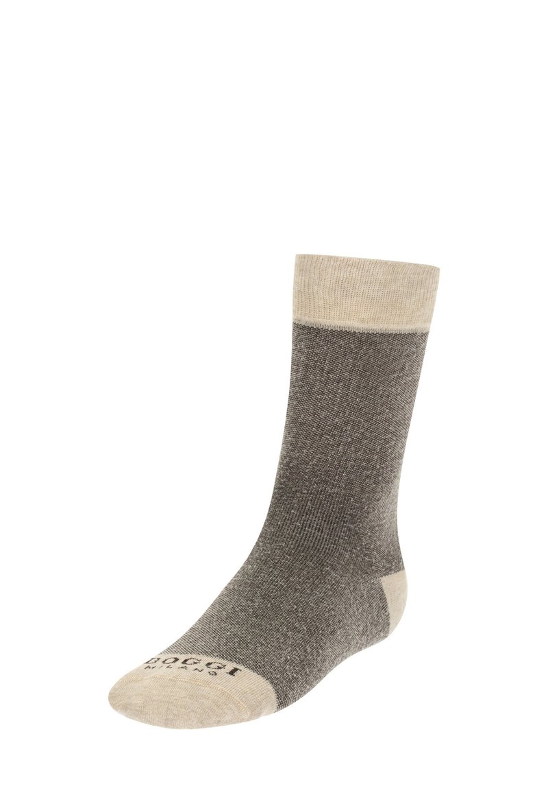 Grå och beige strumpa med en färgblockdesign, ljusbeige mudde, slät textur och logotyp tryckt på tån.