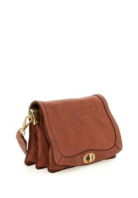 Brown leather handbag featuring embossed leaf patterns, a flap closure, and gold-tone hardware. Smooth texture with a structured shape.