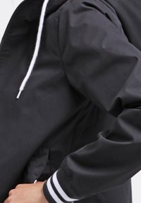 TWINTIP Allvädersjacka - black