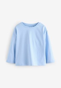 Lichtblauw, t-shirt met ronde hals gemaakt van zachte katoen. Heeft een relaxte pasvorm met korte, wijde mouwen en een eenvoudige zoom. Geen patronen of versieringen.