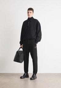 BOSS LEVETE - Treningo apatinė dalis - black