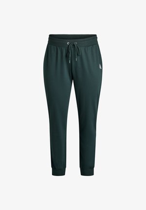 Tamsiai žali jogger tipo kelnės su elastinga juosta, virvelės užsegimu, sutrauktomis kulkšnimis ir mažuoju logotipu dešinėje klubo pusėje.