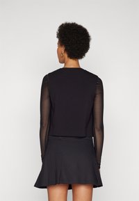 Vero Moda VMWAVE STRING WAISTCOAT - Strukirani kaput - black