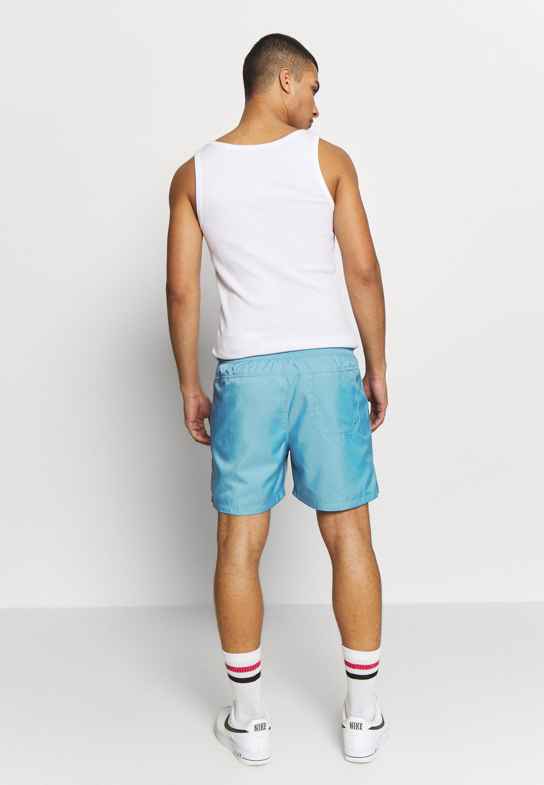 Nike Sportswear FLOW Shorts ceruleanwhite Zalando.no Nike Sportswear FLOW - Shorts - cerulean/thunderstorm/white
