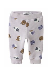 Joggers tissés de couleur lilas clair, dotés d'un motif texturé avec des visages d'animaux colorés, une taille élastique et des poignets ajustés.